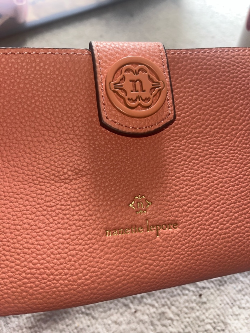 Nanette Lepore Textured Leather Crossbody Wallet - Coral Pink - Picture 1 of 4